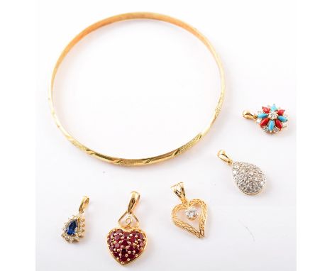 14ct gold bangle by "Erdal" and give assorted 14ct gold pendants