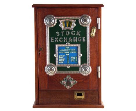 Stock Exchange penny slot machine, with one key, 66.5cm high At the time of cataloguing this machine works ie a coin inserted