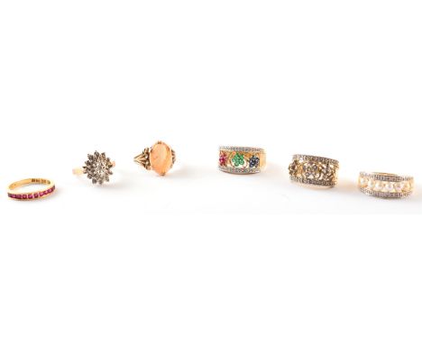 5 assorted stone set dress rings and an 18ct gold band stone set ring