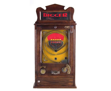 The Digger Allwin penny slot pinball machine, with keys, 84cm high The machine appears to operate correctly and pays a coin o