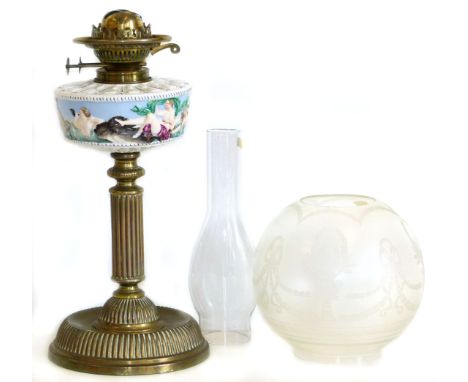 Victorian oil lamp, porcelain reservoir with Italian decoration, brass base frosted shade.
