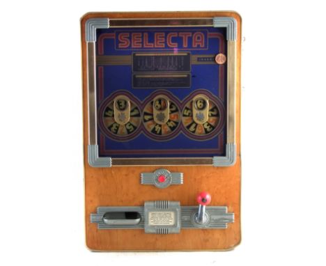 Wulff Germany Selecta slot machine, running of one penny pieces, with keys, 73cm high The machine will operate the three drum