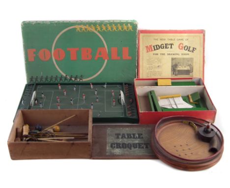 Vintage games, to include Table Football tinplate game in box, Midget Golf in box, Table Croquet with wood box and one other 