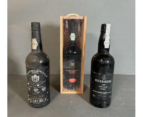 Three bottles of vintage port, A Feuerheerd 1985, a Delaforce 1977 and a Cockburns 1997