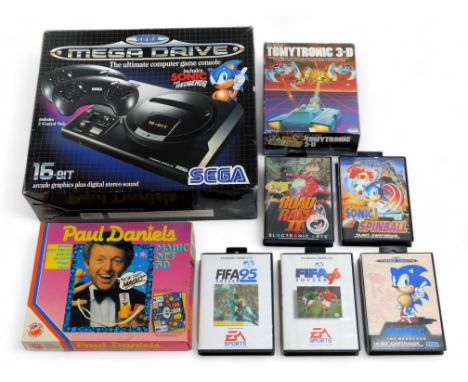 A Sega Megadrive and games, including Sonic Spinball, Sonic The Hedgehog, Fifa Soccer 95, Fifa Soccer 96, with a Tomytronic 3
