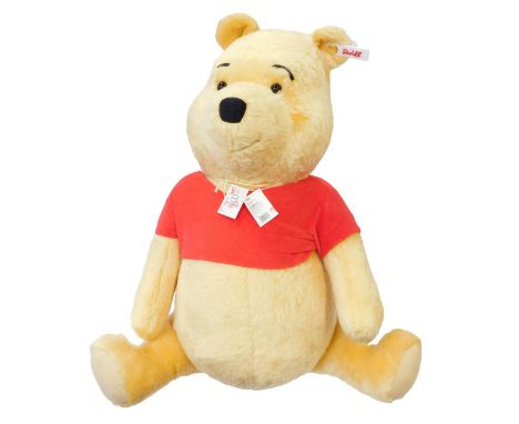 A Steiff Winnie the Pooh studio bear, model 690600, with tag and labels, 82cm high. 