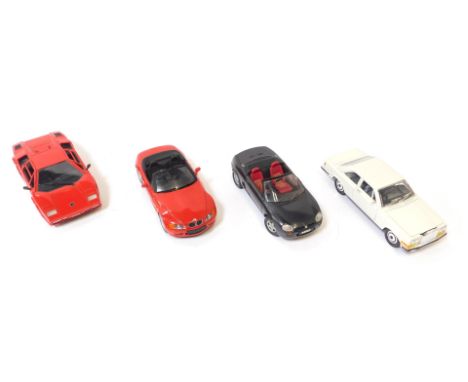 Four diecast vehicles, comprising a UT model 1-18 scale BMW Z3, Polistil Tonka Lamborghini Countach 5000, Corgi MGF, and a Bu