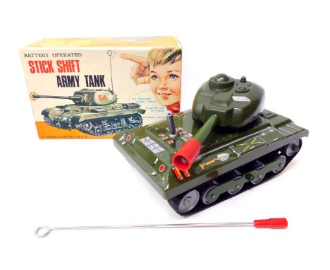 A TN Nomura tinplate battery operated stick shift army tank, boxed. 