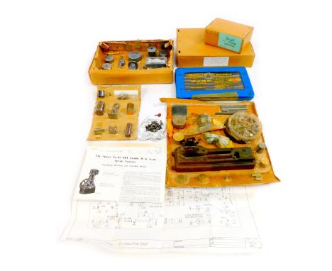 Tools and castings, comprising Stewart ST engine castings, 10 volt castings with disc wheels and a Draper tap and die set nin
