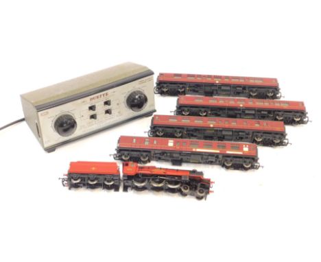 A Hornby OO gauge class 5972 Hogwarts Castle, 4-6-0, and first class coach and brake coach (x2). (1 tray) 