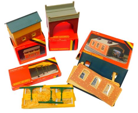 Four OO gauge Hornby railway structures, comprising platform canopy, signal box, brick bridge and engine shed, boxed. (4)