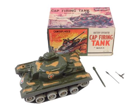 A Marx battery operated cap firing camouflage battery operated tank, boxed. 