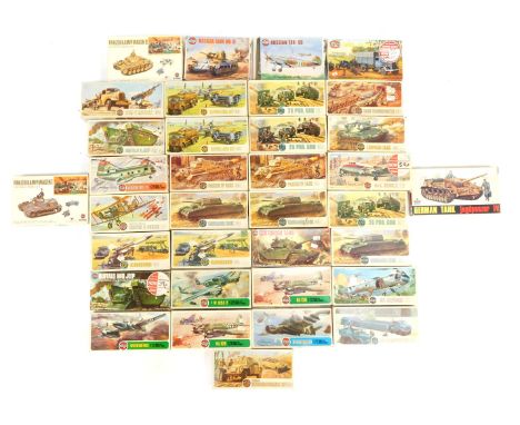 A collection of Airfix model kits, for planes and armoured vehicles, to include two crusader tanks, a 25 paw gun, two Bristol