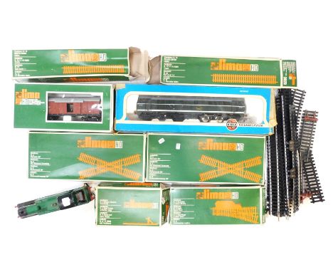 HO and OO gauge, comprising Lima HO gauge track, boxed, a Lima HO gauge wagon, boxed, an OO gauge kit built locomotive, and a