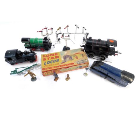 Various tinplate locomotives, to include Lone Star Locomotives Treble O gauge railway station, station figures, level crossin