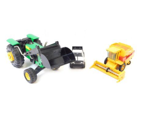 Three Tonka trucks, comprising a green Tonka tractor, combine harvester and a truck. (3)