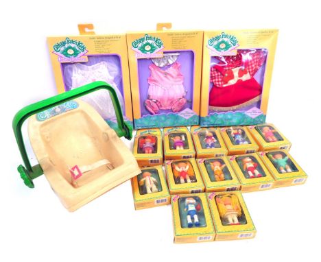 Cabbage Patch Kids figures and accessories, comprising carry cot, cased posable figures, and two clothing packs. (1 tray) 