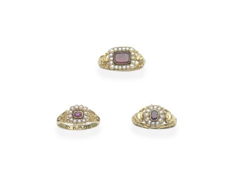 THREE SEED PEARL AND GEM-SET CLUSTER RINGS, MID 19TH CENTURY1st: The oval-cut garnet set within a seed pearl cluster, between