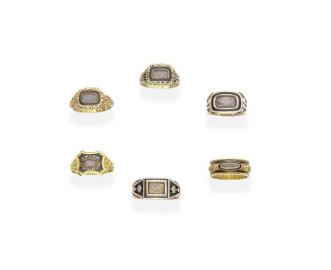 SIX GOLD, ENAMEL AND HAIRWORK MEMORIAL RINGS,  FIRST HALF OF 19TH CENTURY1st: The glazed compartment with woven hairwork, wit