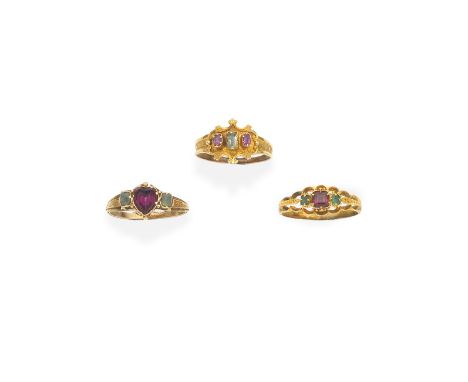 THREE GARNET AND EMERALD GOLD RINGS,  MID 19TH CENTURY1st: The heart-shaped garnet, between two step-cut emeralds, the hoop w