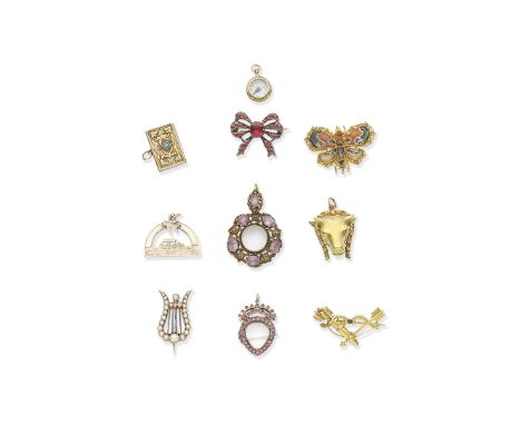 COLLECTION OF BROOCHES, PENDANTS AND CHARMS, EARLY 19TH - EARLY 20TH CENTURY1st: Early 20th century bow brooch, set with red 