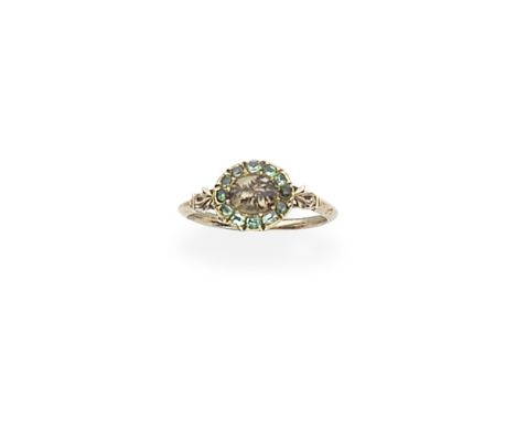 EMERALD AND MOSS AGATE CLUSTER RING, CIRCA 1800The oval moss agate cabochon, within an oval-shaped emerald surround, between 