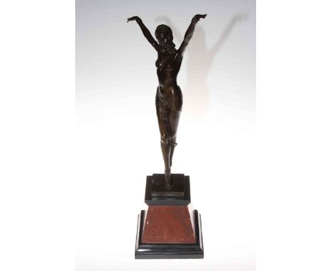 Art Deco bronze lady in a dancing pose, on marble plinth, 54cm high.