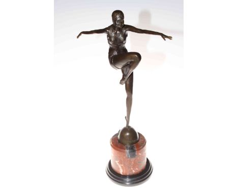 Art Deco bronze lady figure in a dancing pose on marble plinth, 56cm high.