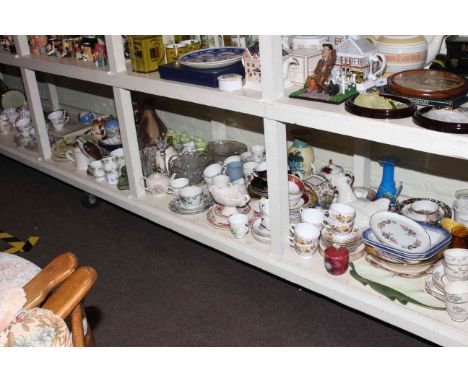 Full shelf of glass and china including teawares, Beswick Osprey decanter, jardiniere and stand, carpet beater, etc.