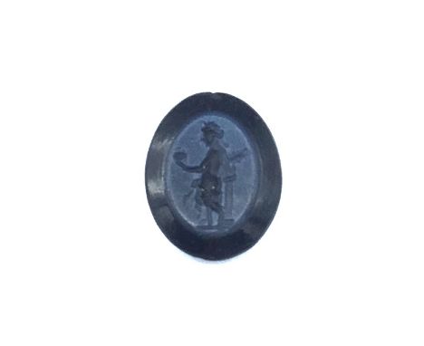 Roman Intaglio with goddess, C. 1st - 3rd Century AD. An intaglio with an image of what appears to be a goddess leaning again