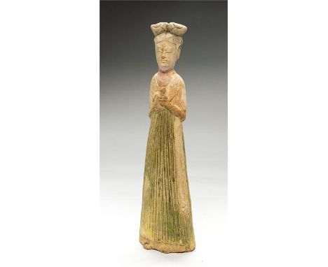 Chinese Northern Wei Dynasty Tomb Figure of a Female, 386-534 AD 

 A glazed ceramic figure of a female, hair pulled up into 