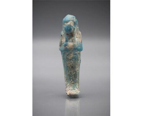 Egyptian Light Blue Faience Shabti, Third Intermediate Period, C. 1070 - 718 BC. Egyptian faience shabti figure with nice bri