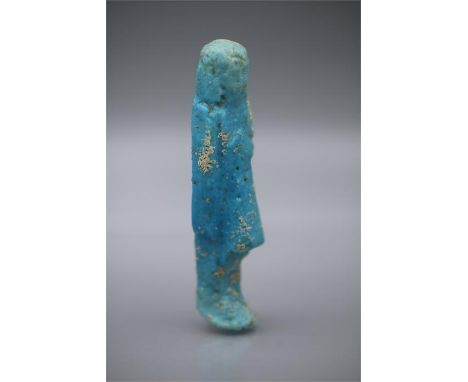 Egyptian Overseer Shabti, Third Intermediate Period, 1070 - 712 BC A bright blue glazed faience Egyptian Overseer shabti with