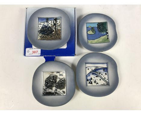 A set of four Arabia of Finland Four Seasons studio ceramic dishes / plaques designed by Helja Liukko Sundstrom, one in origi
