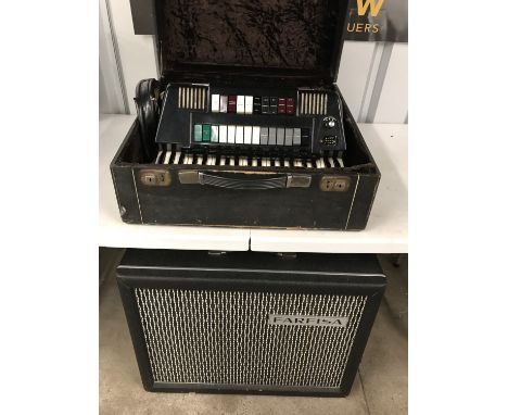 A Farfisa Transivox piano accordion together with a Farfisa TR70 - 0S combo amplifier
