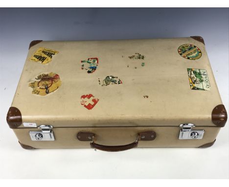 A vintage "Globe-Trotter" faux-velum suitcase