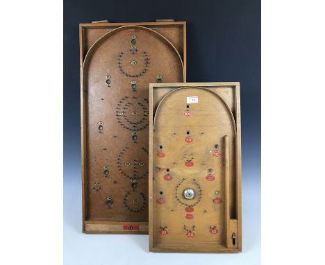 An Exitoy bagatelle board together with a Chad Valley bagatelle board