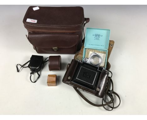 A Zeiss folding camera with Carl Zeiss Jena Tessar 1:2.8 f=8cm lens, together with a cased Butterfield Ikometer, Kalimar ligh