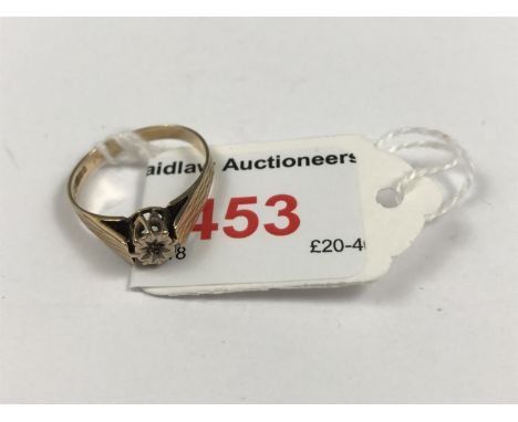A vintage diamond solitaire ring, the illusion set brilliant being crown and cathedral set on an engine turned 9ct gold shank