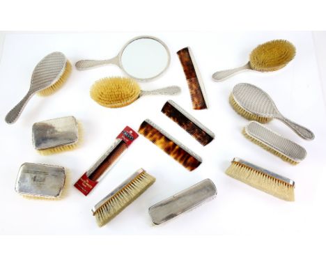 Selection of silver-mounted dressing table items, mostly by Thomas D Pannett &amp; Son Ltd, London 1956, with engine-turned d