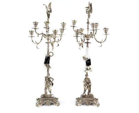 Pair of silver plated six-light candelabra, the bases mounted with classical figures and with figural finial, 72 cm high (2) 