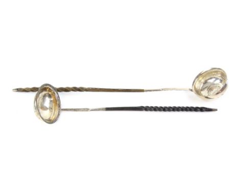 18th century white metal punch ladle inset with a Queen Anne coin with whale bone handle and another with beaded border, .   