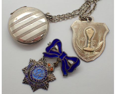 Silver locket silver religious pendant and silver Royal Army Service Corps badge
