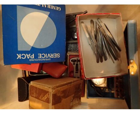 Box of watch and clock repair tools