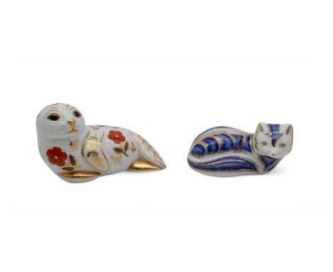 Two Royal Crown Derby paperweights including a Seal, with gold button and an Artic fox, second Condition Report:Available upo