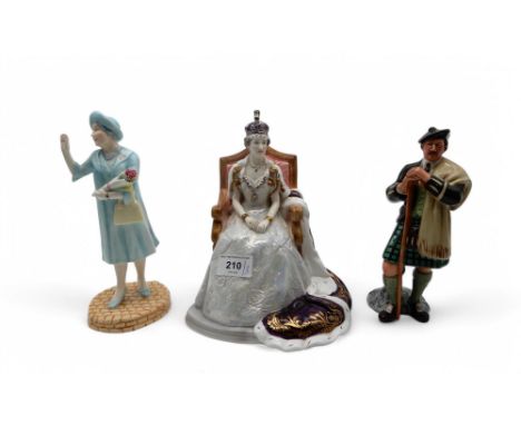 A Royal Worcester figure Queen Elizabeth II in coronation robes, no 107/500, Royal Doulton The Laird, and another H.M. The Qu