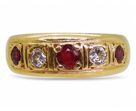 An 18ct gold ruby and diamond ring, size O1/2, weight 8.9gms Condition Report:Available upon request