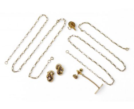 A collection of 9ct gold items, a pair of clip on earrings with swirl design, a fishing fly and knot tie pins, and a selectio