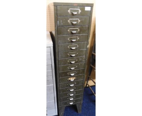 A mid 20th century steel industrial tool chest with fifteen drawers on tapering supports, 121cm high x 28cm wide x 41cm deep&