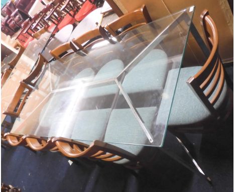 A lot comprising a contemporary glass topped chrome based dining table, 75cm high x 190cm long x 90cm deep and eight stained 